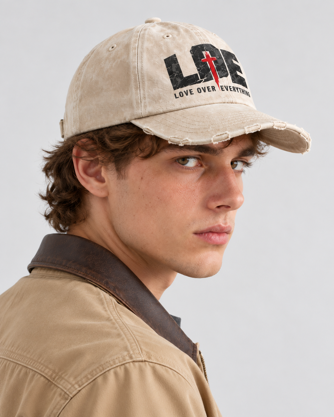 Model wearing the white Love Over Everything cap | color:white