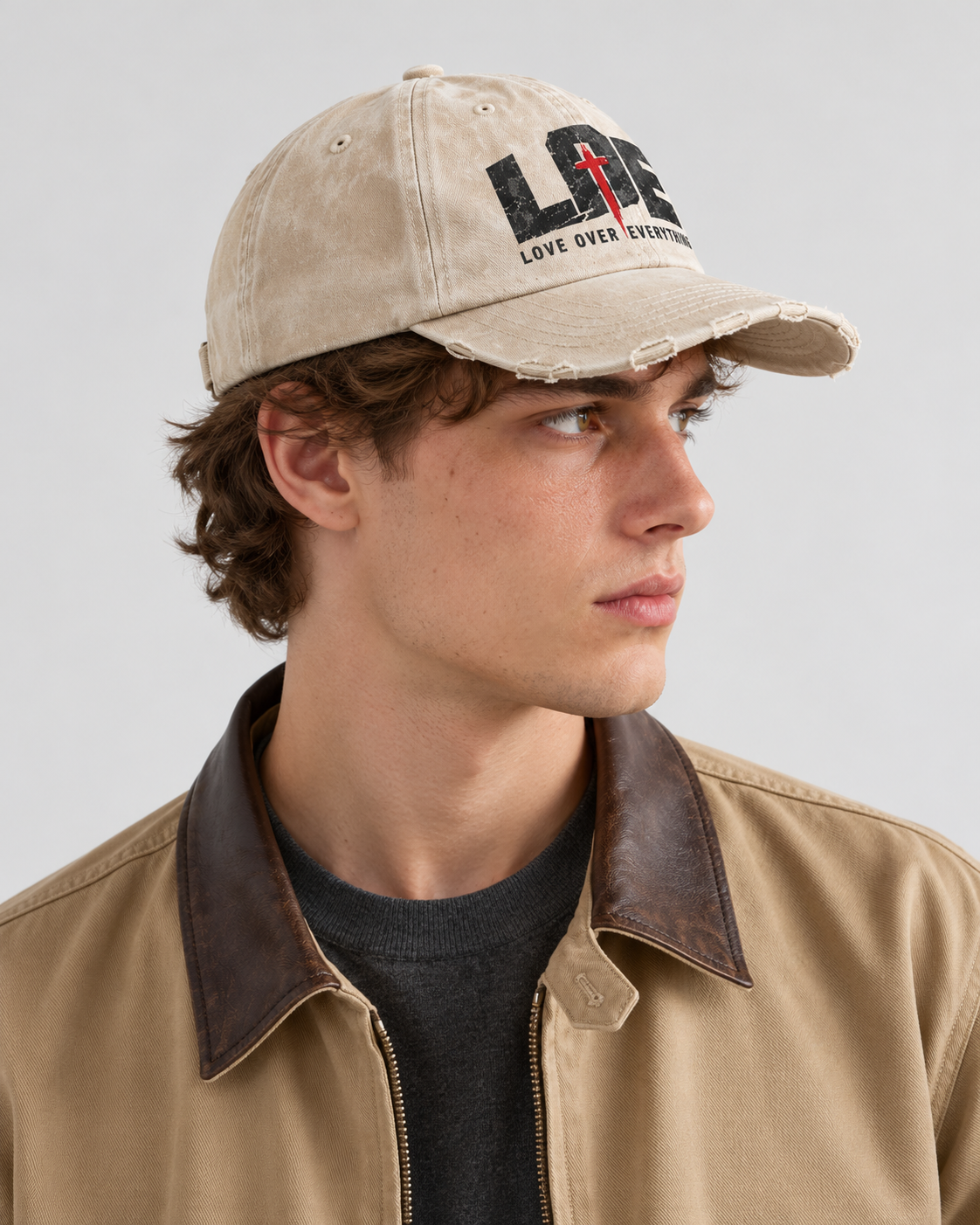 Model wearing the white Love Over Everything cap | color:white