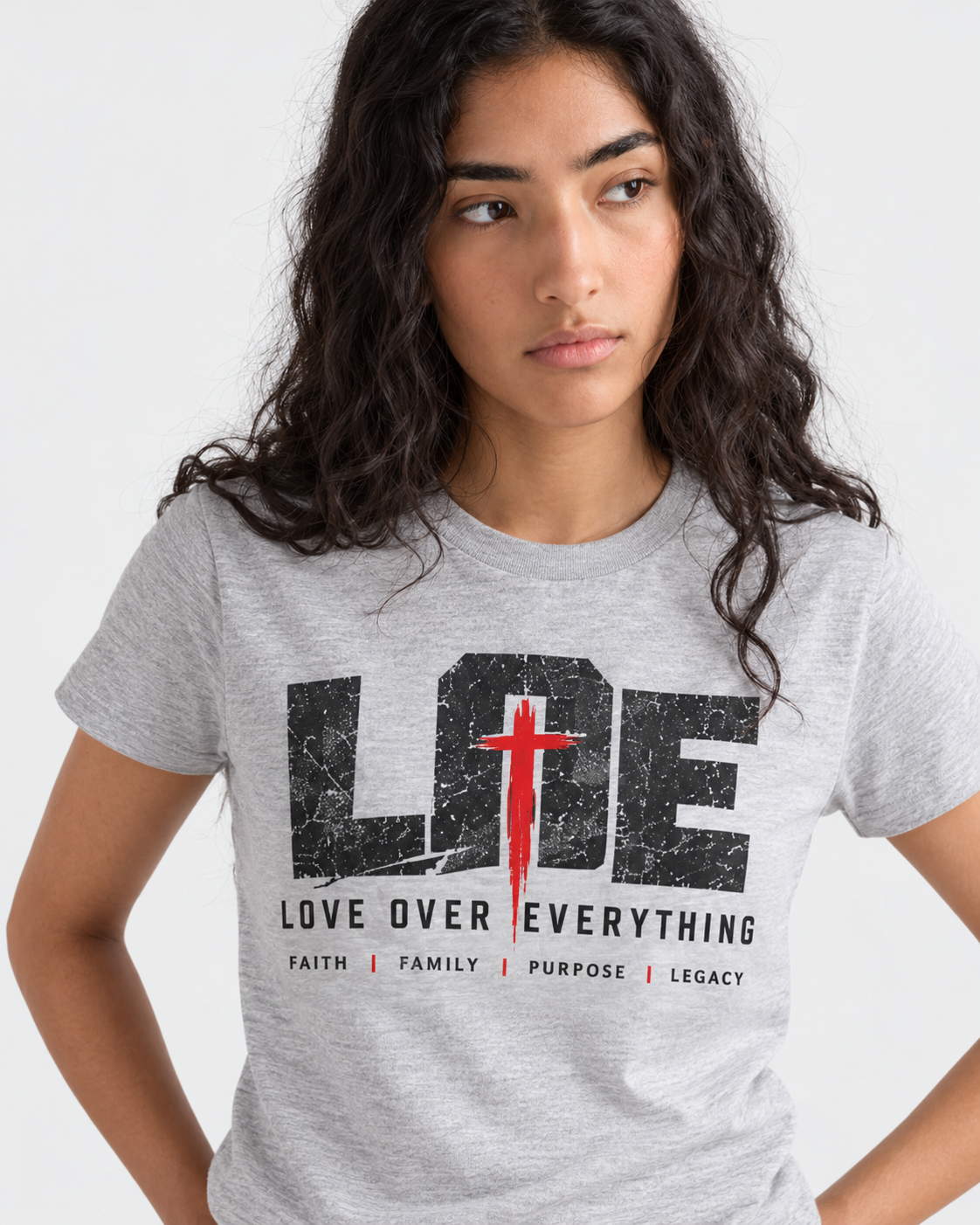 Model wearing the gray Love Over Everything T-shirt