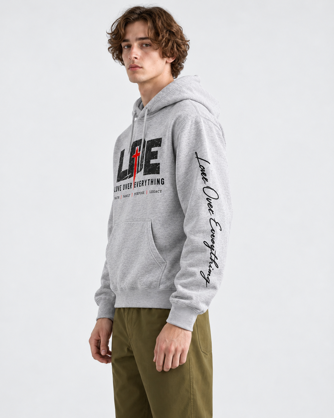 Model wearing the gray Love Over Everything hoodie
