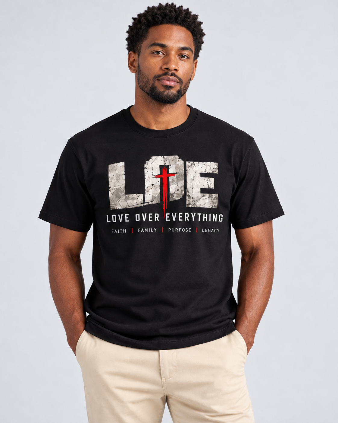 Model wearing the black Love Over Everything T-shirt | color:black