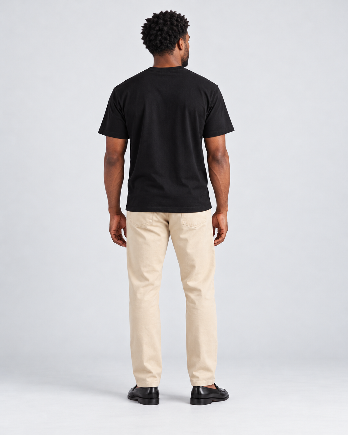 Model wearing the black Love Over Everything T-shirt | color:black