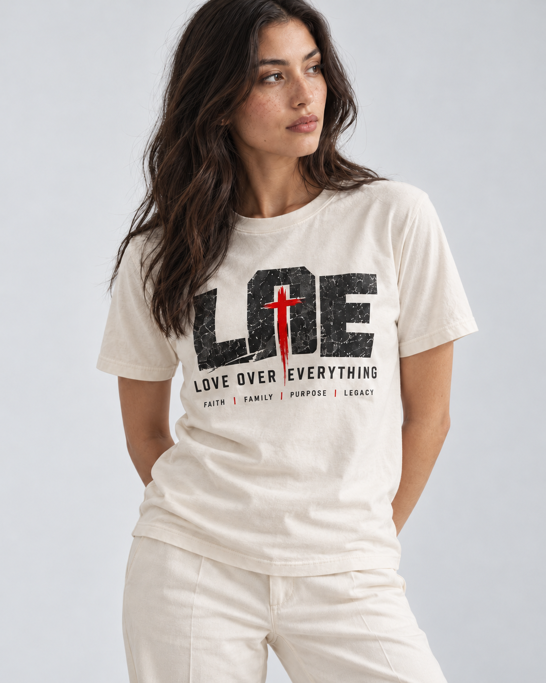 Model wearing the wihte Love Over Everything T-shirt | color:white