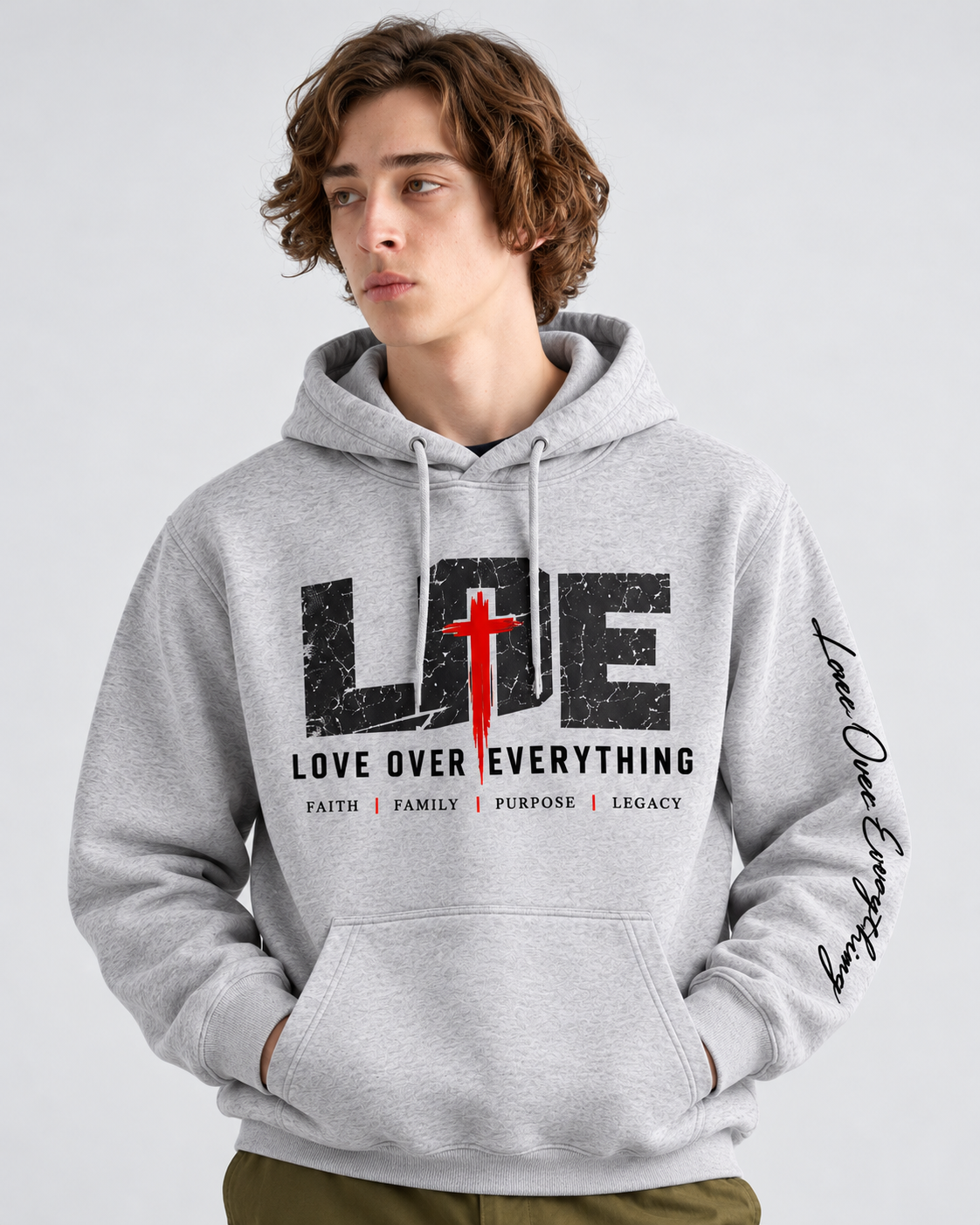 Model wearing the gray Love Over Everything hoodie